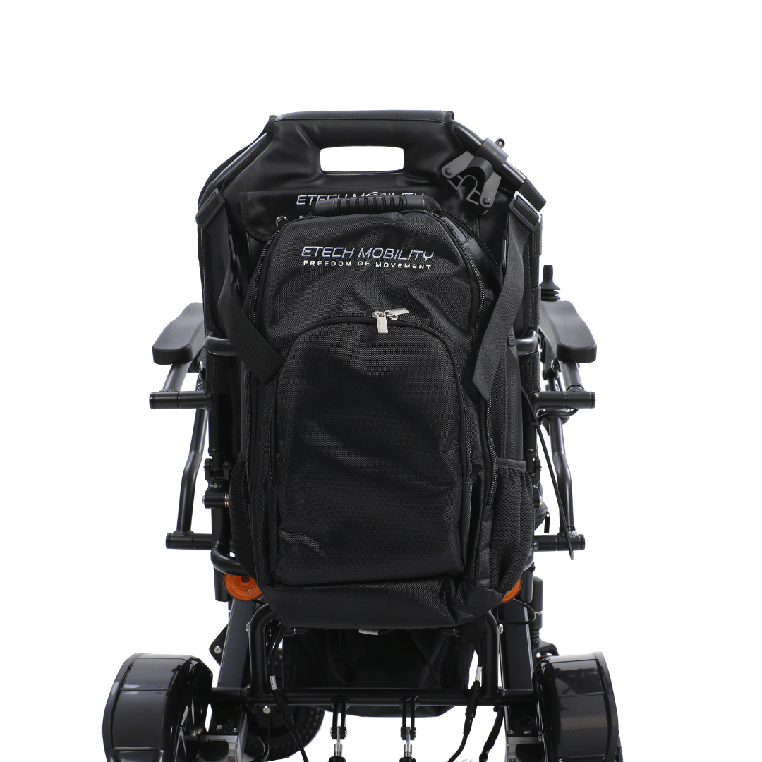 Black backpack with Etech Mobility branding on an electric wheelchair with multiple compartments