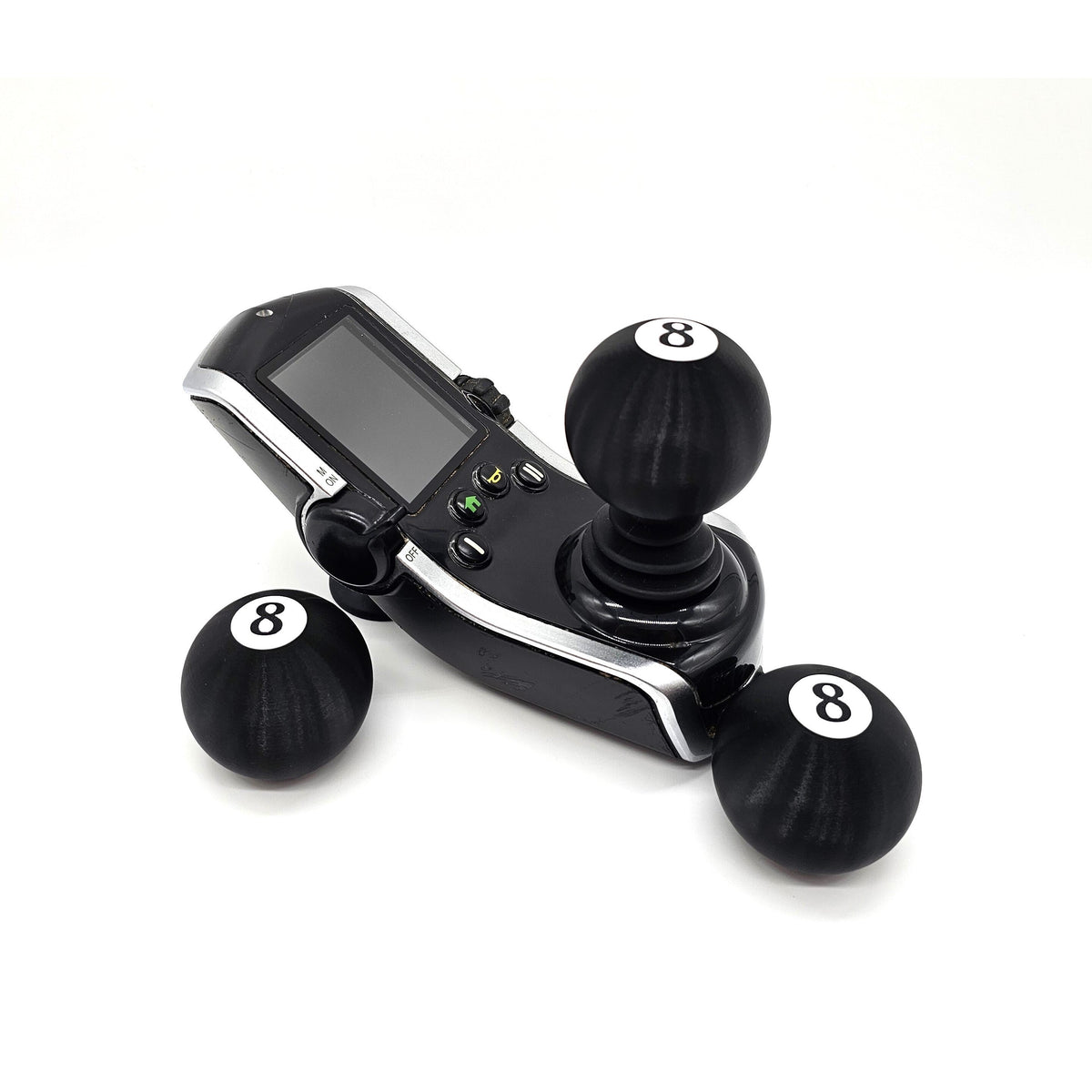 8 ball joystick topper on an electric wheelchair controller
