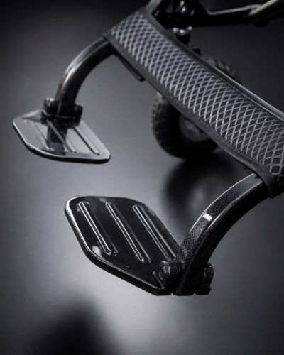 Atlas HD lightweight folding carbon fibre electric wheelchair with dual footplates for comfort by Etech Mobility