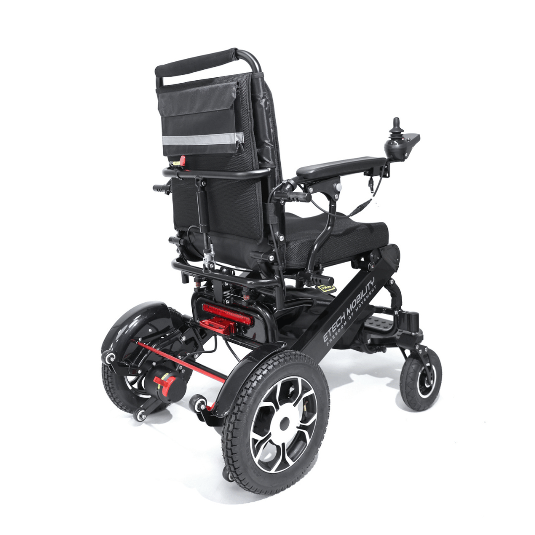 Converge 180 motor splitting lightweight folding electric wheelchair with 12 inch rear tyres for multi terrain by Etech Mobility in black 
