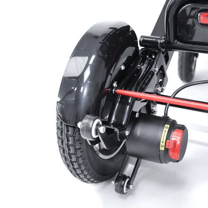 Converge 180 insta split lightweight folding electric wheelchair with anti tip wheels and mudguard on 12 inch rear tyres by Etech Mobility