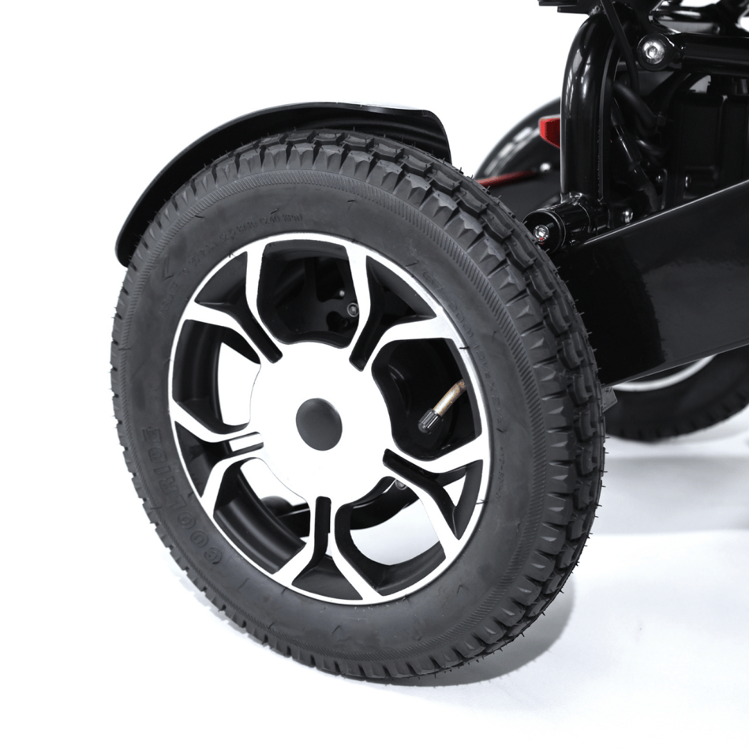 Converge 180 multi terrain heavy duty lightweight folding electric wheelchair with instant splitting motors and 12 inch rear tyres by Etech Mobility