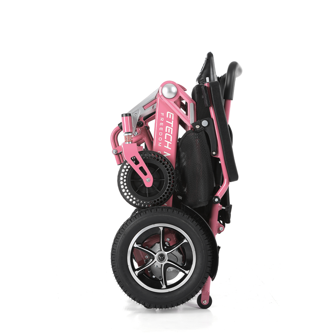 Lightweight foldable powerchair by Etech Mobility in limited edition pink in compact folded state for travel and easy storage