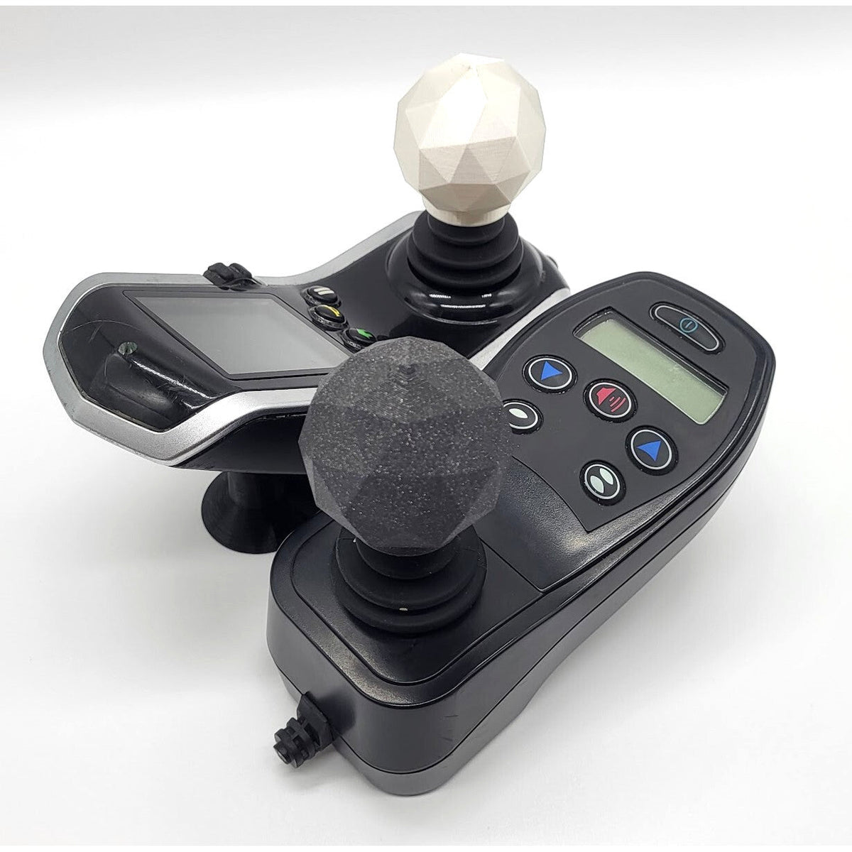 GeoDome joystick topper on an electric wheelchair controller