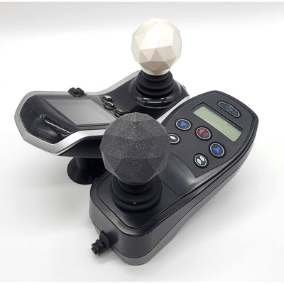 GeoDome joystick topper on an electric wheelchair controller