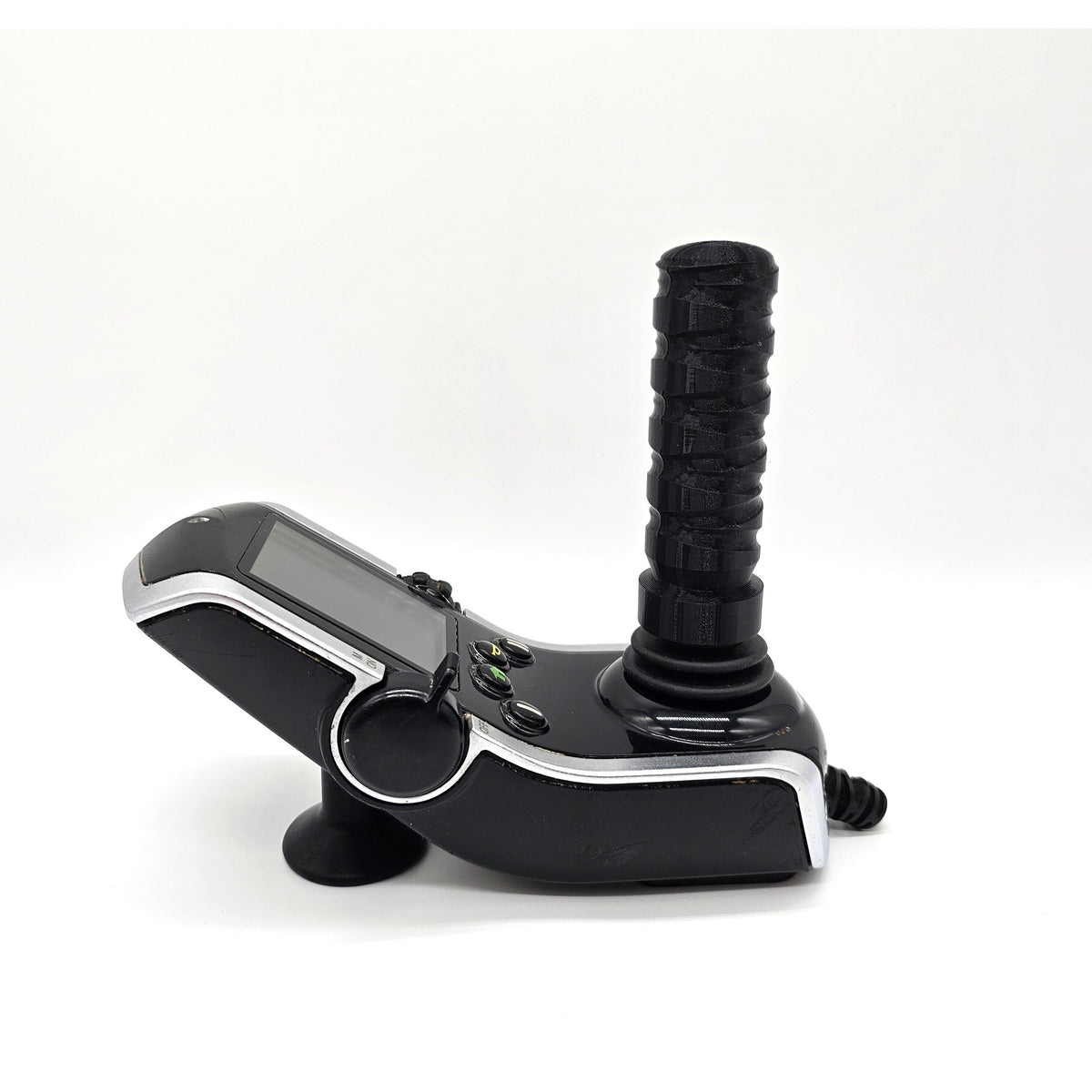 Grip Stick ergonomic joystick handle on an electric wheelchair controller