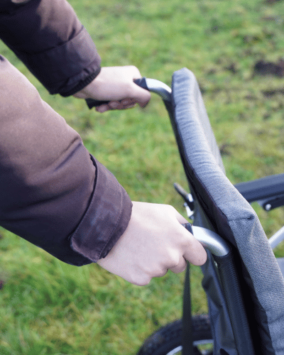 Built in convenient push handles designed for the carer by Etech Mobility for LitePro 2 ultra lightweight electric wheelchair