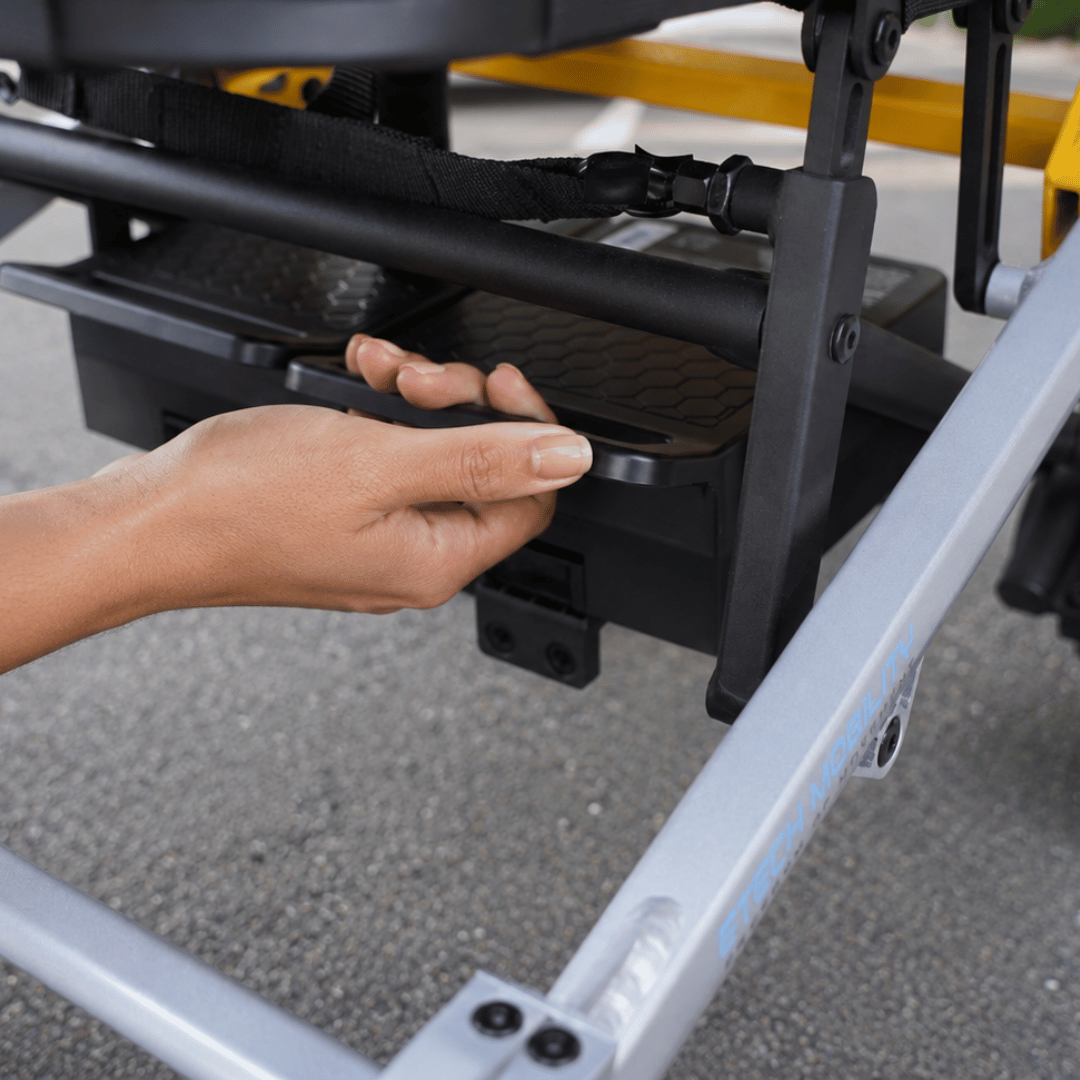 MagNeo lightweight folding electric wheelchair with dual battery capacity and airline friendly batteries by Etech Mobility