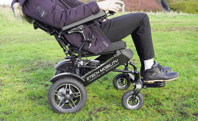 Sine wave brushless electric wheelchair tackling grass with reclining feature | Etech Mobility