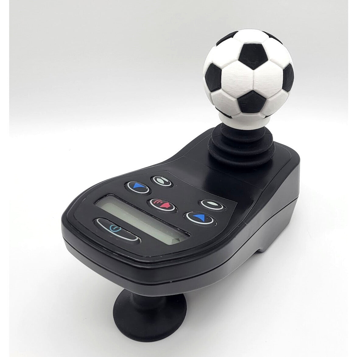 Soccer ball joystick topper on an electric wheelchair controller