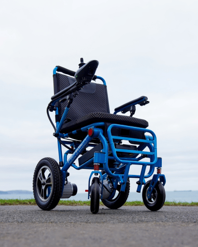 Ultra-lightweight motorised 300W powerchair designed by Etech Mobility in Blue