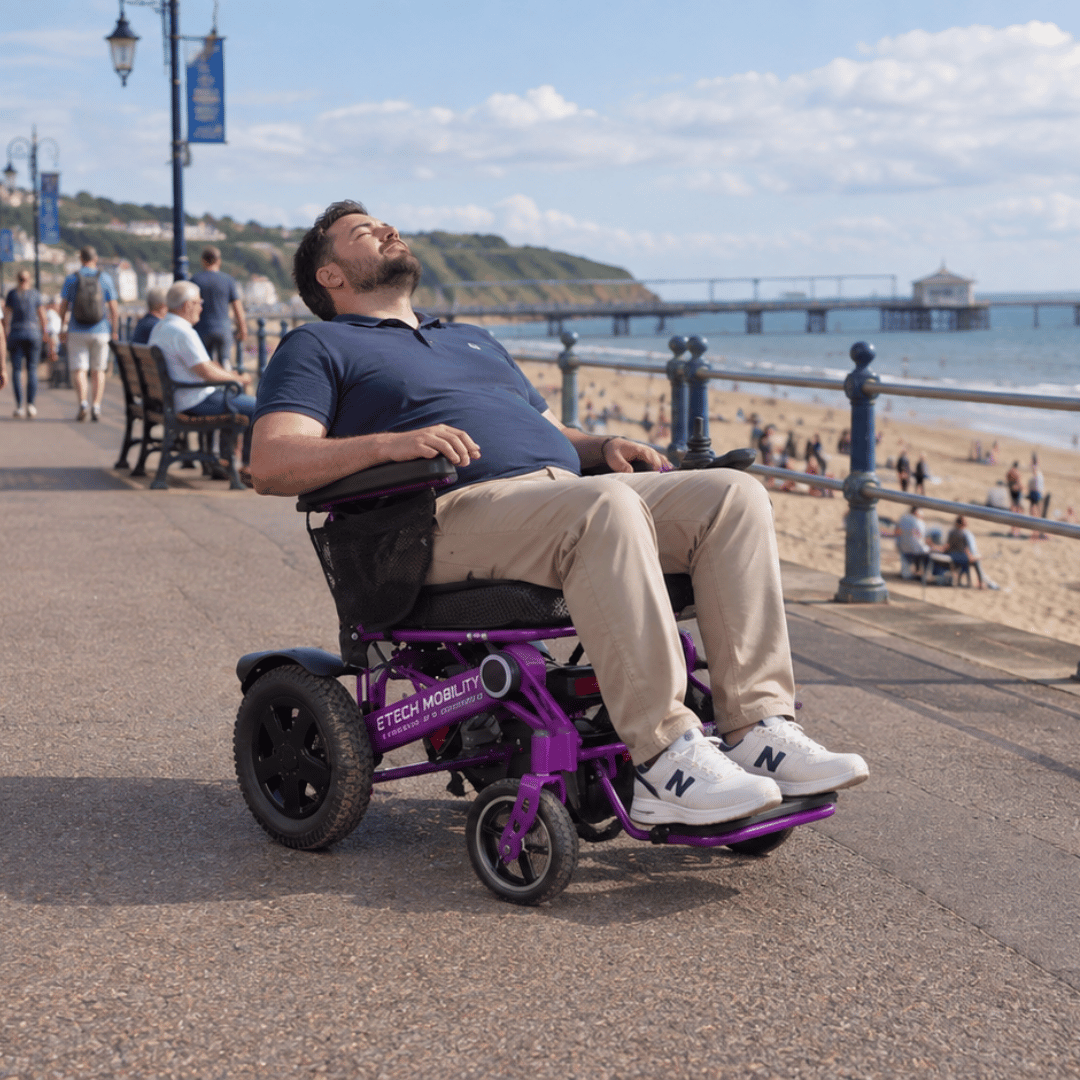 Vanguard 200 lightweight folding electric wheelchair for bariatric users with reclining backrest for increased comfort by Etech Mobility