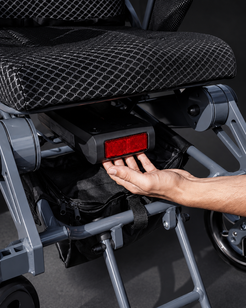 Vanguard 200 lightweight foldable electric wheelchair with long range removable battery by Etech Mobility
