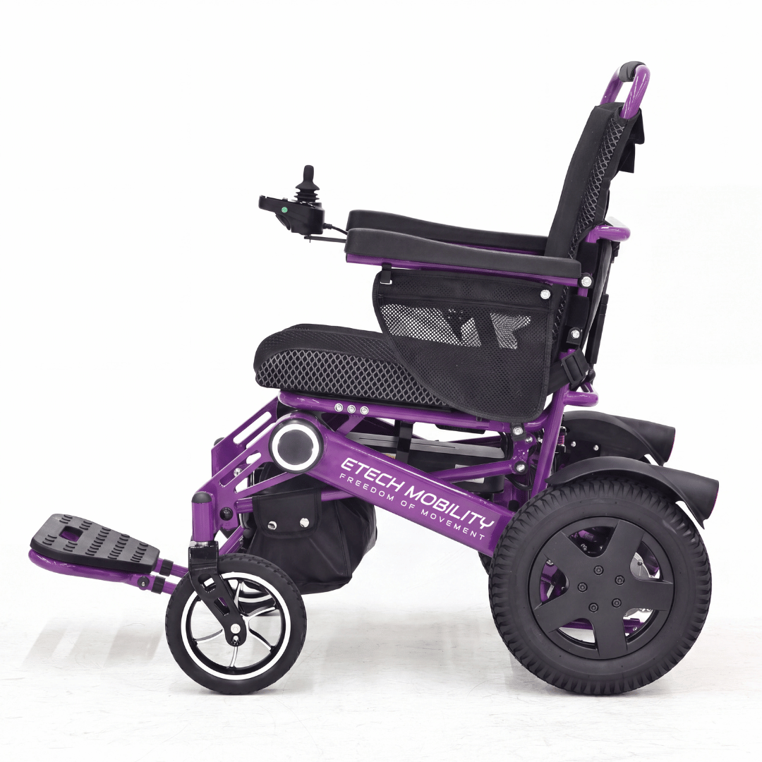 Vanguard 200 lightweight foldable electric wheelchair in purple with lights on side frame and solid puncture proof tyres by Etech Mobility