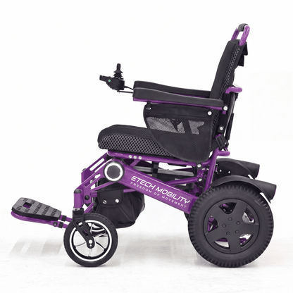 Vanguard 200 lightweight foldable electric wheelchair in purple with lights on side frame and solid puncture proof tyres by Etech Mobility