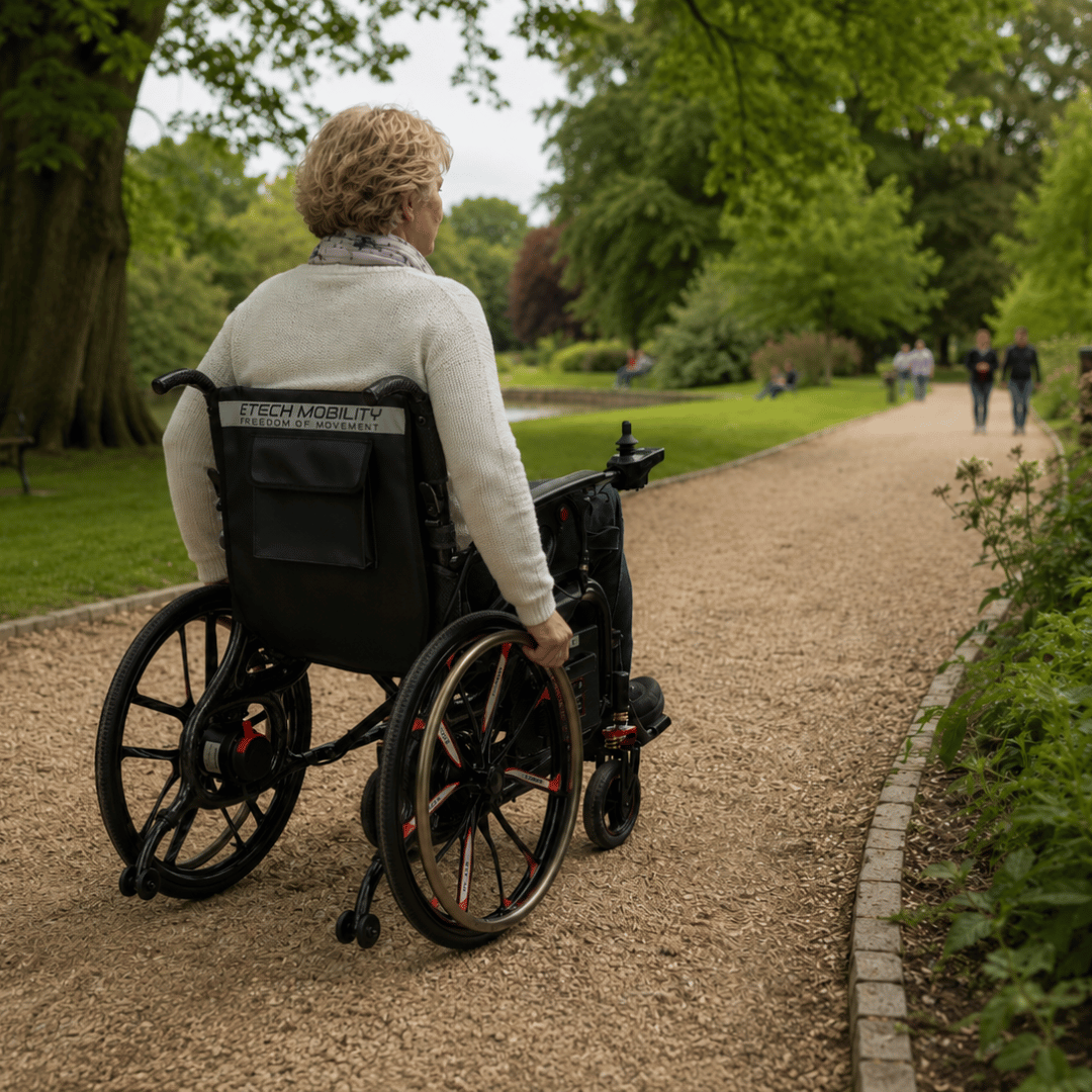 Lightweight folding self propelling electric wheelchair with self propel safety net by Etech Mobility