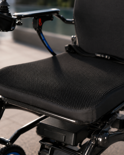 Vector Carbon fibre, comfortable mesh seat for lightweight foldable electric wheelchair by etech mobility